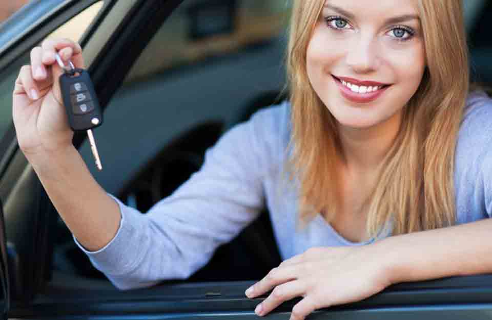 Happy lady with car keys